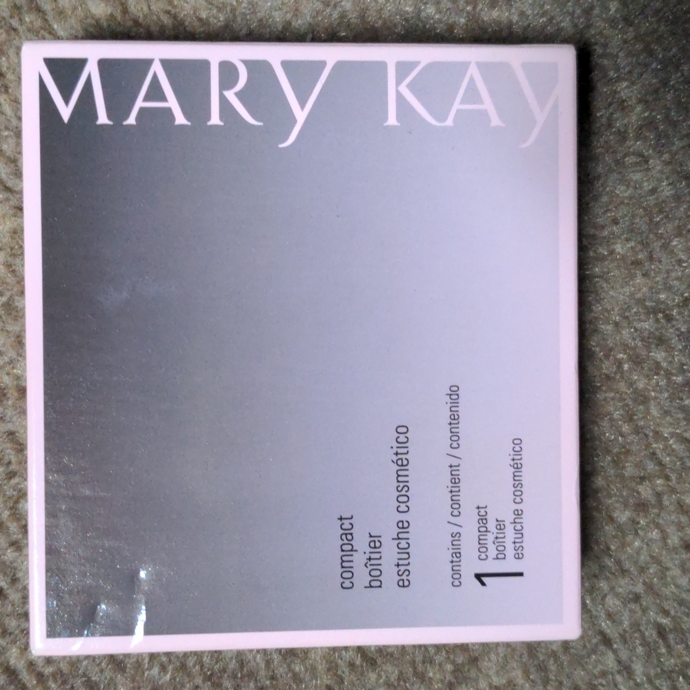 Mary Kay compact, holds lipstick, eye, cheek colors.